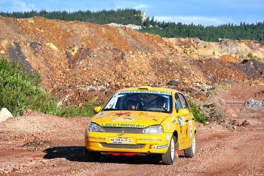 BAKAL, RUSSIA - JULY 21: Alexey Petrov's Lada Kalina (No. 22) competes at the annual Rally Southern Ural on July 21, 2012 in Bakal, Satka district, Chelyabinsk region, Russia.