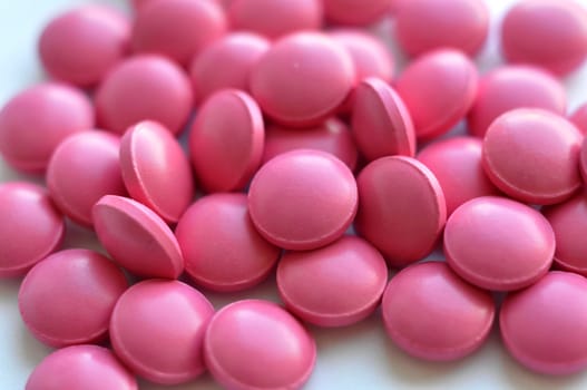 Scattering of pink tablets.