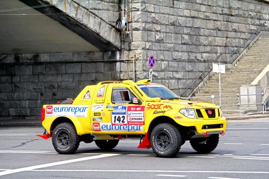 MOSCOW, RUSSIA - JULY 7: Etienne Smulevici's Proto Eurorepar No. 142 of Sodicars Team takes part at the annual Silkway Rally - Dakar series on July 7, 2012 in Moscow, Russia.