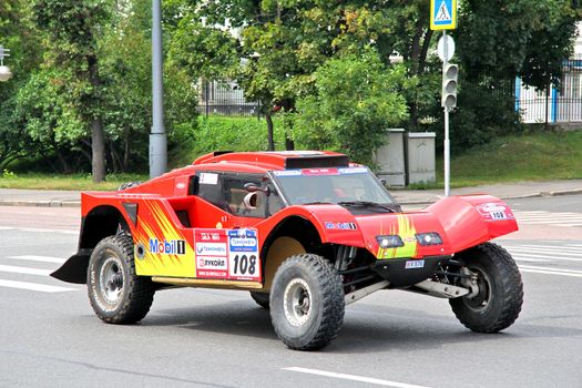 MOSCOW, RUSSIA - JULY 7: Ronan Chabot's SMG Buggy No. 108 of SMG Team takes part at the annual Silkway Rally - Dakar series on July 7, 2012 in Moscow, Russia.