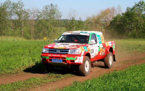 TATARSTAN, RUSSIA - JUNE 15: Driver Xu Lang (Team Dessoude), car model Zhengzhou Dongfeng Oting during Rally Transorientale 2008 on June 15, 2008 near city of Naberezhnye Chelny, Tatarstan, Russia.