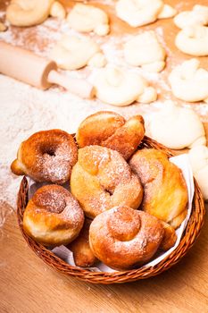 Fresh donats with sugar powder and prepared dough