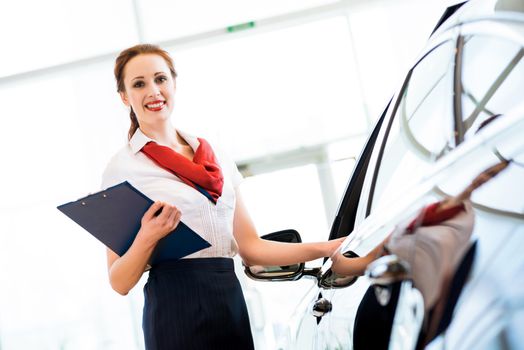 portrait of a young woman in a showroom consultant