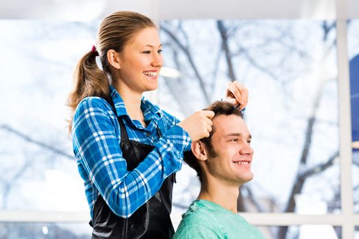 young attractive woman hairdresser hairstyle customer picks