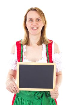 Smiling woman in dirndl holding clean blackboard