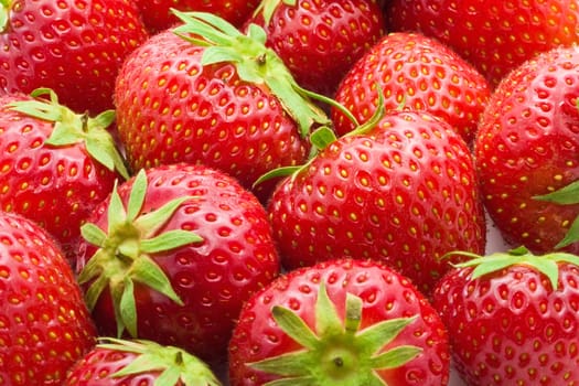 Red sweet strawberries making nice edible background