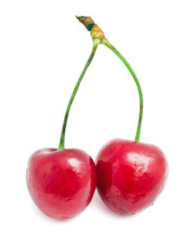 Beautiful red cherry isolated on white background