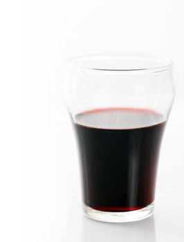 Shooter glass of port wine or other dark red spirit