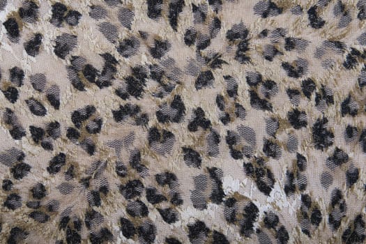 Material in abstract patterns, a textile background.