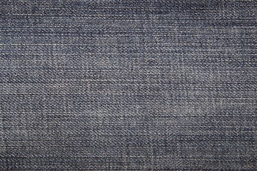 The worn, blue jeans, a textile background
