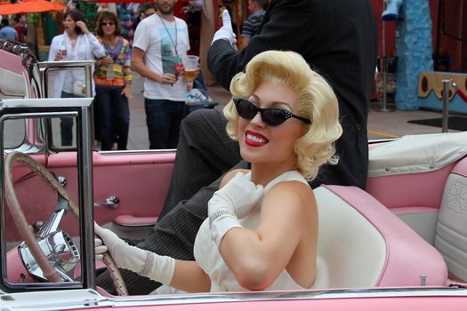 HOLLYWOOD, CA, USA - SEPTEMBER 17, 2011: Blond girl model like Marilyn Monroe in the Universal Studios 17 September in 2011, Hollywood.