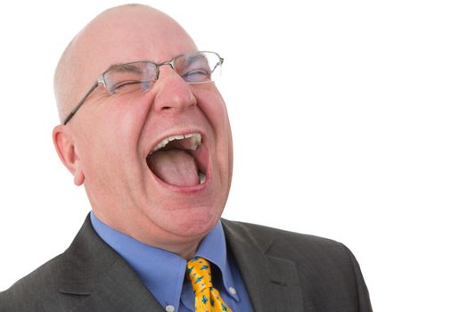 Horizontal close-up portrait of a Caucasian middle-aged bald businessman wearing glasses and formal business suit while laughing out loud with closed eyes and open mouth, isolated on white background