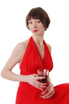 Elegant woman in dress with red glass of wine over white