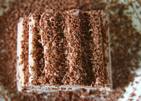 Chocolate ice cream and hardered chocolate over