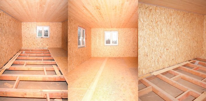 General view of the space of the room in the process of finishing a wooden building material