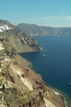 View on rock coastline on Santorini island, Greece.