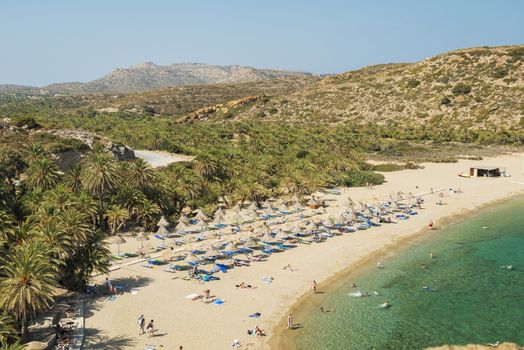 The is one of the the most beautiful place  of the Mediterranean island of Crete. It features the largest natural palm forest in Europe.  The beach of Vai is beautiful but nowadays it is entirely fenced off and covered in beach beds and umbrellas. This certainly reduces its charm, especially when you add the masses of visitors. 