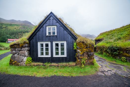 Traditional Icelandic House with grass roof in Skogar Folk Museum, Iceland