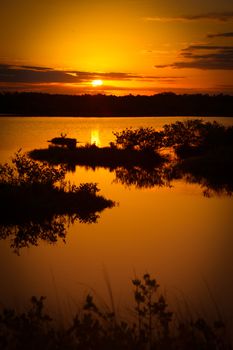 Lake at sunset, Black Point Wildlife Drive, Merritt Island National Wildlife Refuge, Titusville, Florida, USA