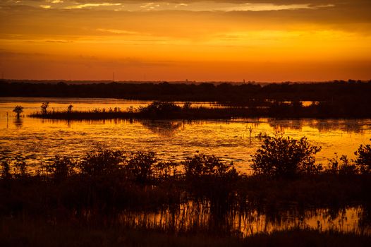 Lake at sunset, Black Point Wildlife Drive, Merritt Island National Wildlife Refuge, Titusville, Florida, USA
