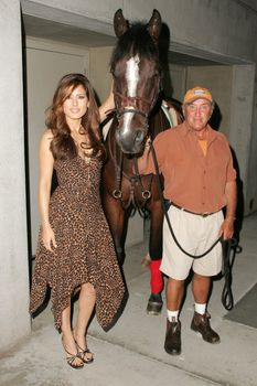 Keri Kasem, Jerry McKinley and "Playboy" the horse arriving on Sunset Blvd. at the In Touch Pets and their Stars Party with her horse "Playboy," Cabana Club, Hollywood, CA 09-21-05