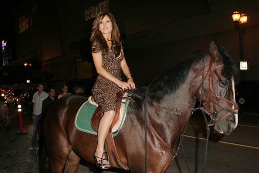 Kerri Kasem and her horse "Playboy" arriving on Sunset Blvd. at the In Touch Pets and their Stars Party with her horse "Playboy," Cabana Club, Hollywood, CA 09-21-05