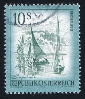 AUSTRIA - CIRCA 1973: stamp printed by Austria, shows sailing vessel on Lake Neusiedl, circa 1973
