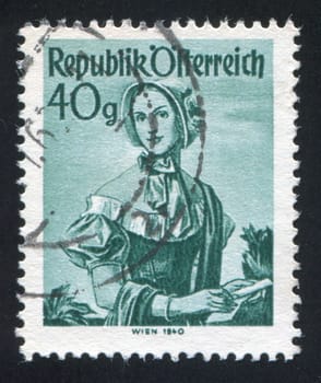 AUSTRIA - CIRCA 1949: stamp printed by Austria, shows Woman in Austian costumes, circa 1949