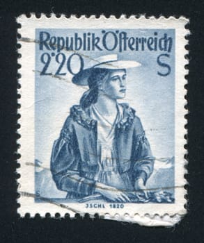 AUSTRIA - CIRCA 1952: stamp printed by Austria, shows Woman in Austian costumes, circa 1952