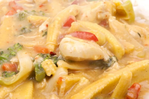 diced chicken in coconut curry sauce served with rice