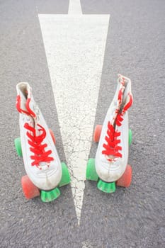 Hdr Picture of Old Vintage White Skate Boot on the Asphalt Sterret