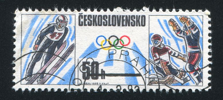 CZECHOSLOVAKIA - CIRCA 1988: stamp printed by Czechoslovakia, shows Olympics, Ski jumping, ice hockey, circa 1988