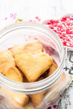 Cookie as a heart shaped valentine decor in glass jar