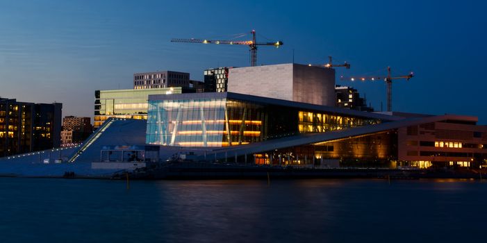 OSLO, NORWAY - JUNE 28: National Oslo Opera House at sunset on June 28, 2012. Oslo Opera House was opened on April 12, 2008 in Oslo, Norway