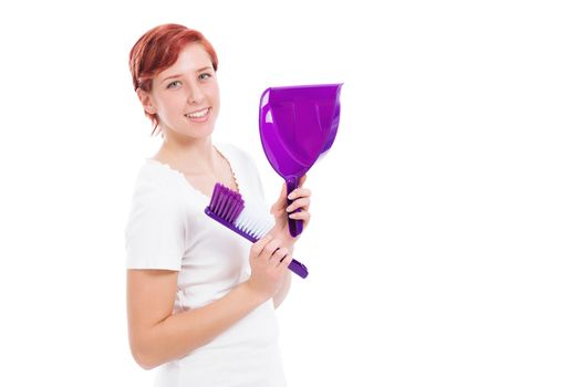 happy redhead woman with purple brush and shovel