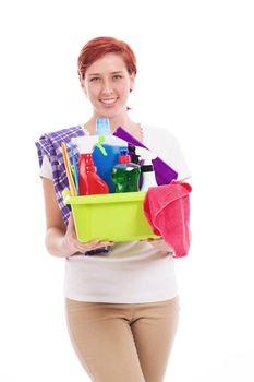 happy redhead woman with cleaning utensils on white background