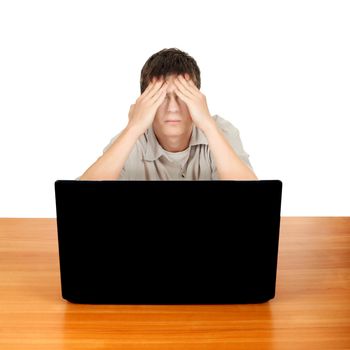 Sick Young Man at the Desk with Laptop feels Headache Isolated on the White