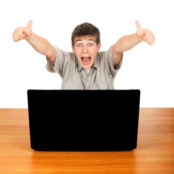 Happy Student at the Desk with Laptop Isolated on the White