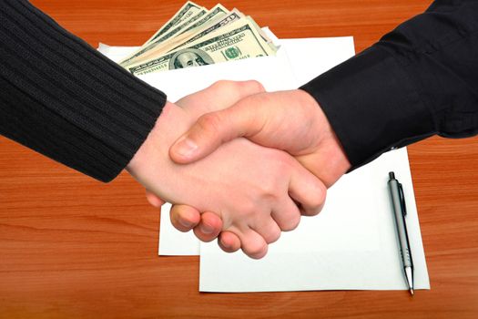 Handshake on Envelope with a Money and Empty Paper