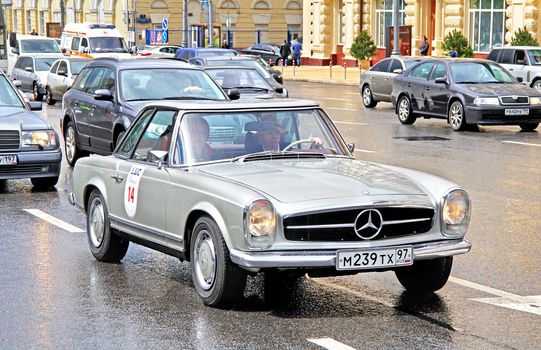 MOSCOW, RUSSIA - JUNE 3: German motor car Mercedes-Benz 250SL competes at the annual L.U.C. Chopard Classic Weekend Rally on June 3, 2012 in Moscow, Russia.
