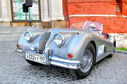 MOSCOW, RUSSIA - JUNE 3: English motor car Jaguar XK150 competes at the annual L.U.C. Chopard Classic Weekend Rally on June 3, 2012 in Moscow, Russia.