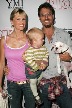 Kylie Bax with daughter Lito and husband Spiros Poros at the In Touch Presents Pets And Their Stars Party, Cabana Club, Hollywood, CA 09-21-05