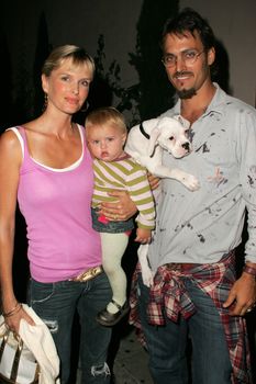 Kylie Bax with daughter Lito and husband Spiros Poros at the In Touch Presents Pets And Their Stars Party, Cabana Club, Hollywood, CA 09-21-05