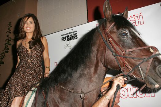 Kerri Kasem arrives on her horse "Playboy" at the In Touch Presents Pets And Their Stars Party, Cabana Club, Hollywood, CA 09-21-05