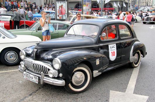 MOSCOW, RUSSIA - JUNE 2: French motor car Peugeot 203 competes at the annual L.U.C. Chopard Classic Weekend Rally on June 2, 2013 in Moscow, Russia.