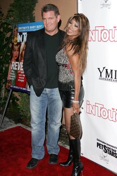 John Edward Yarbrough and Traci Bingham at the In Touch Presents Pets And Their Stars Party, Cabana Club, Hollywood, CA 09-21-05