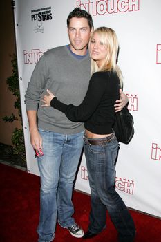 Jaron Lowenstein and Kaley Cuoco at the In Touch Presents Pets And Their Stars Party, Cabana Club, Hollywood, CA 09-21-05