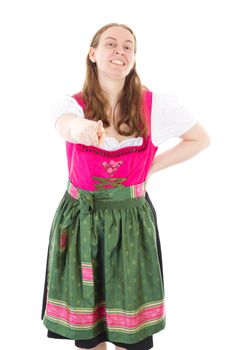 Beautiful girl in dirndl pointing at you