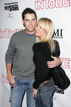 Jaron Lowenstein and Kaley Cuoco at the In Touch Presents Pets And Their Stars Party, Cabana Club, Hollywood, CA 09-21-05