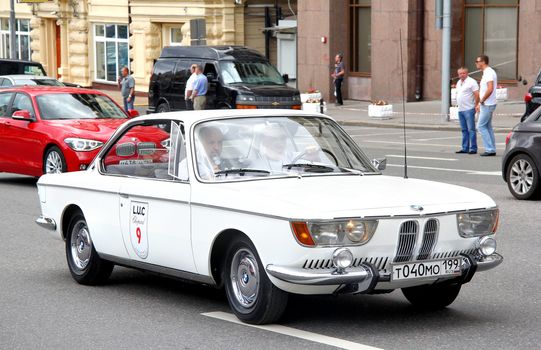 MOSCOW, RUSSIA - JUNE 2: German motor car BMW 2000CS competes at the annual L.U.C. Chopard Classic Weekend Rally on June 2, 2013 in Moscow, Russia.